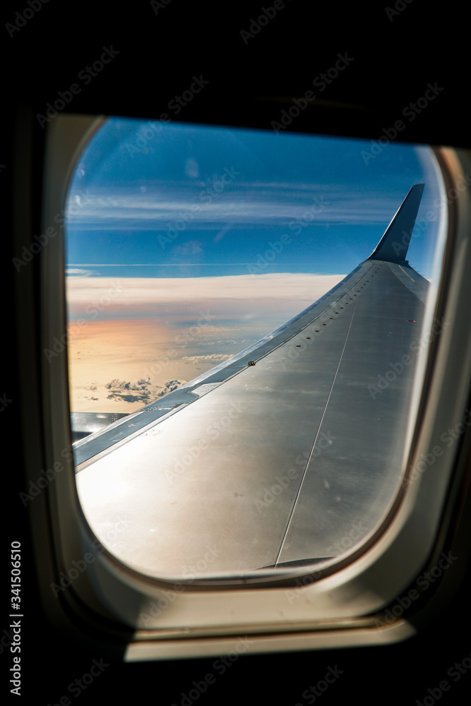Airplane window view of sea Airplane window view of sea
