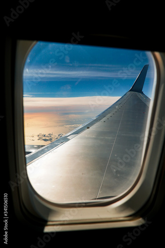 Airplane window view of sea © Adrian