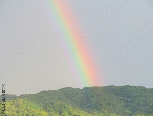 日本の田舎の風景 7月 虹と曇り空
