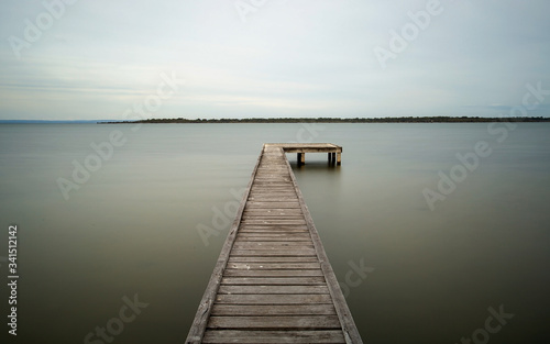 Fototapeta Naklejka Na Ścianę i Meble -  wooden jetty on the river