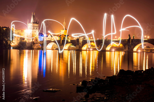 Canvas Print Long exposure photo from Charles Bridge with PRAHA subtitle made by Light painti