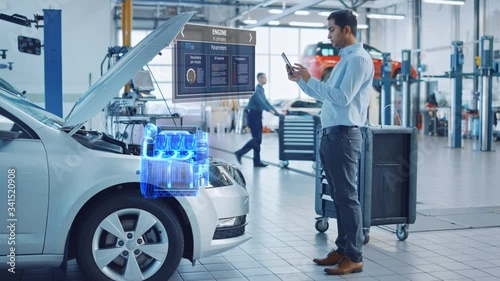 Wallpaper Mural Car Service Manager Uses a Tablet Computer with a Futuristic Augmented Reality Diagnostics Software. Specialist Inspecting the V6 Internal Combustion Engine in Order to Find Broken Components. Torontodigital.ca