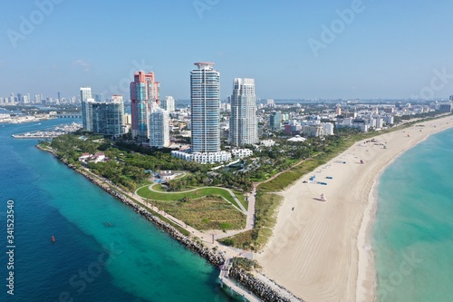 Aerial view of South Pointe Park and South Beach in Miami Beach, Florida devoid of people under coronavirus pandemic beach and park closure. © Francisco