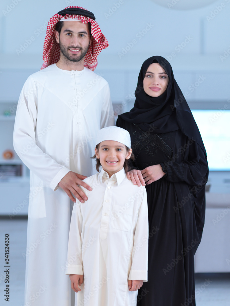 portrait of young happy arabian muslim family