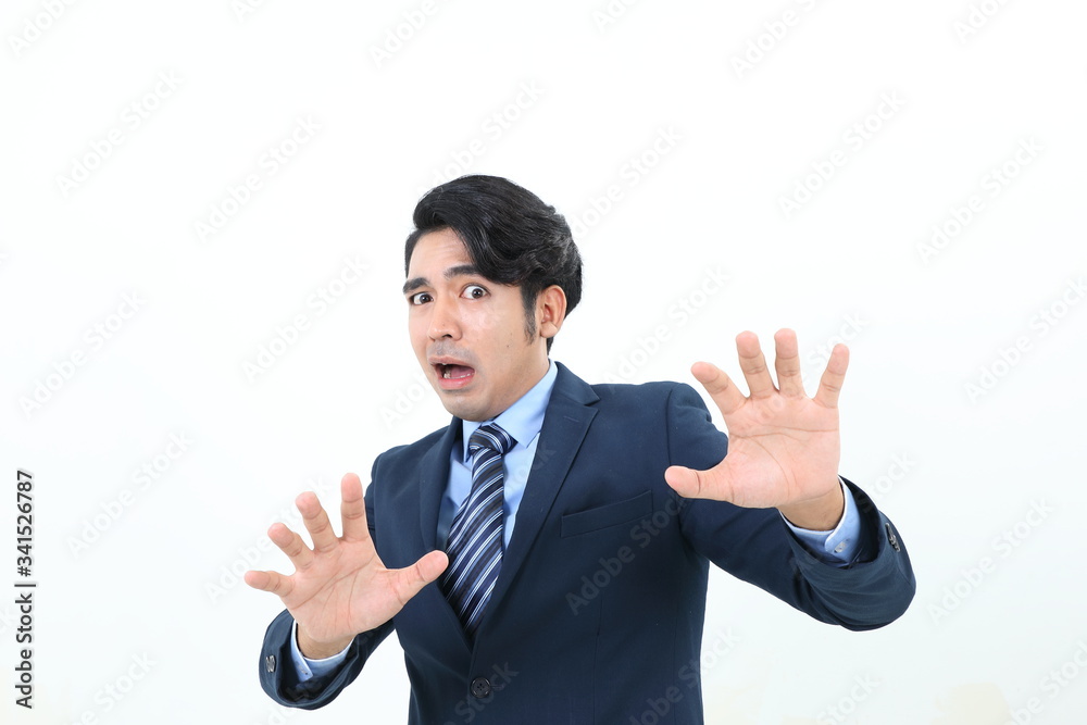 South east Asian Malay Man facial expression shocked scared afraid hand in front self protect South east Asian Malay Man facial expression shocked scared afraid hand in front self protect