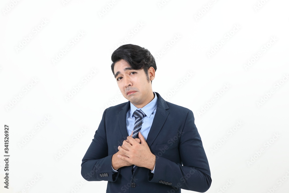South east Asian Malay Man facial expression sad upset hand tied on chest South east Asian Malay Man facial expression sad upset hand tied on chest