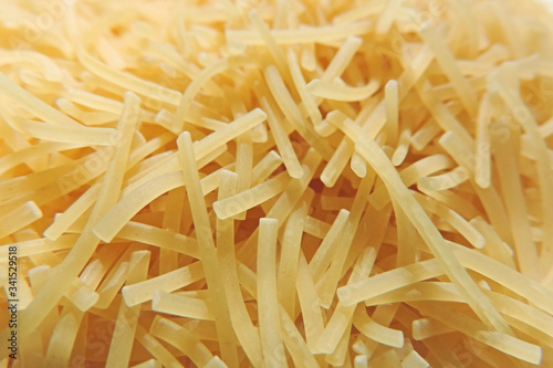Pasta small items noodles made from durum wheat flour, semiproduct, dry and hard photo