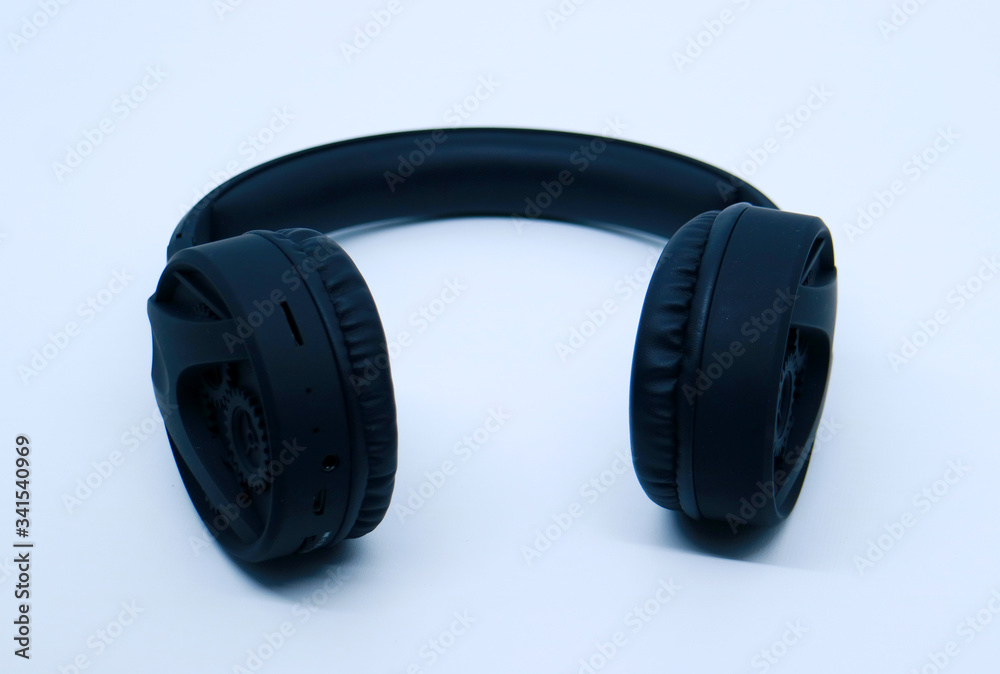 Black headphone on white background.