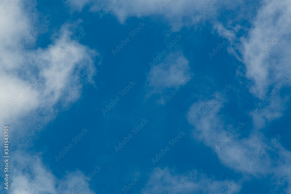 clouds against a blue sky clouds against a blue sky