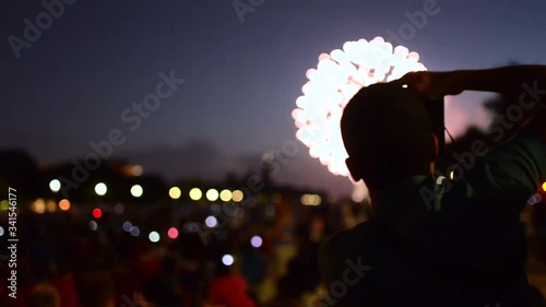Man taking photo of fireworks in Washington DC