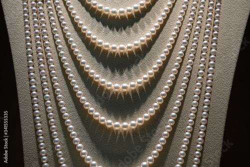 Obraz na plátně Beautiful pearl necklace on mannequin, close up