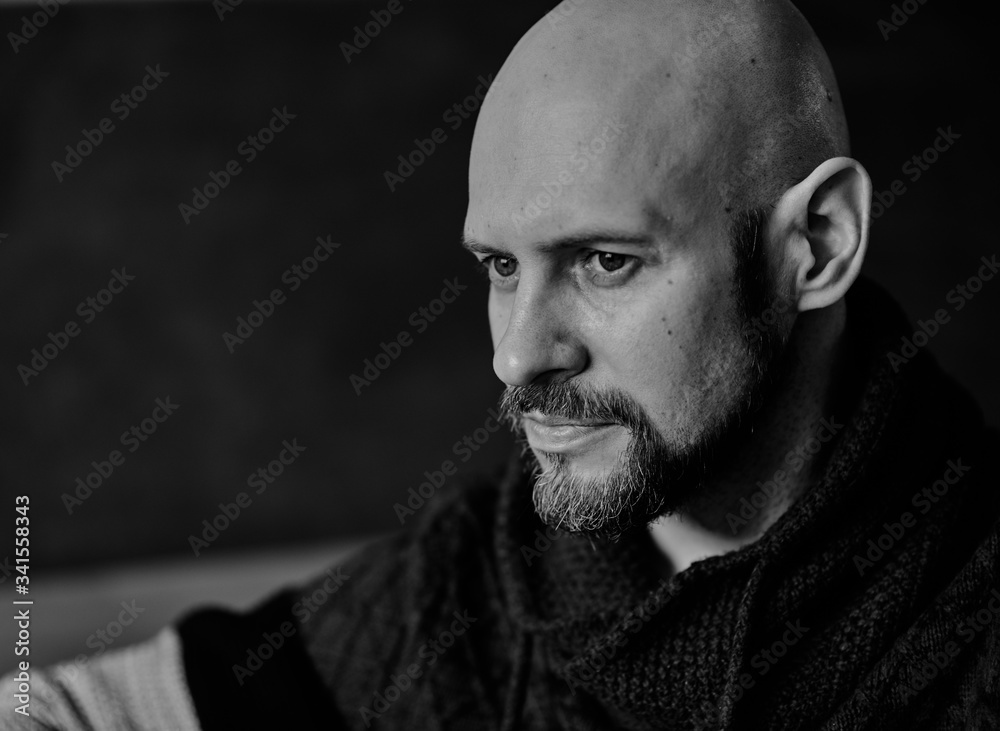 Male prtret bald man with a white beard Male prtret bald man with a white beard