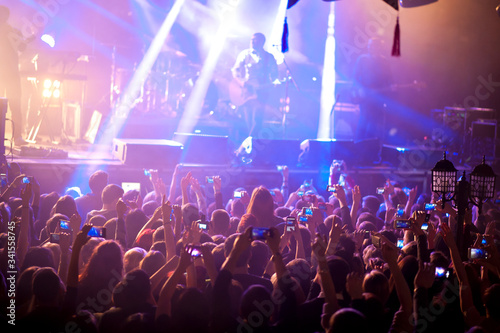 Crowd of people at a rock group concert