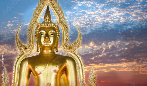 Big golden buddha, Buddha statue on sunset sky background
