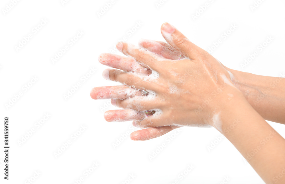Woman use soap and washing hands isolated on white background Woman use soap and washing hands isolated on white background