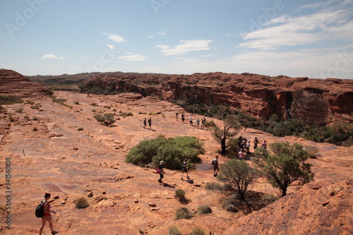 Fotografie Tourists hiking in Kings Canyon National Park outback central Australia