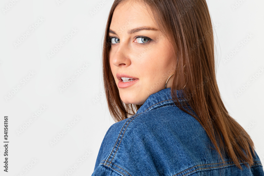 Beautiful young woman wearing a denim jacket Beautiful young woman wearing a denim jacket