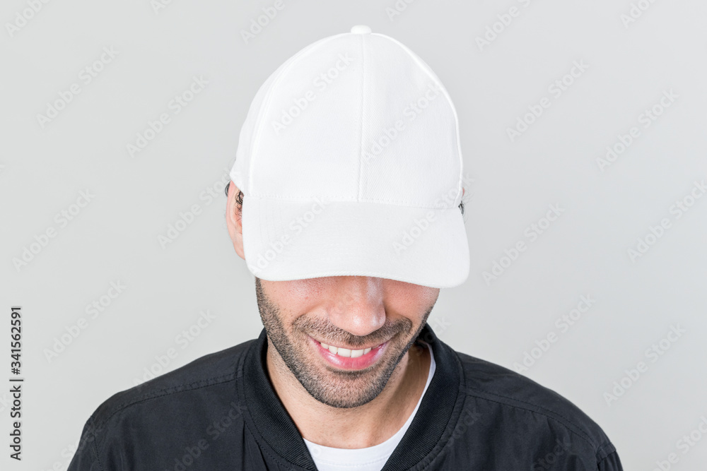 Happy man wearing a white cap Happy man wearing a white cap