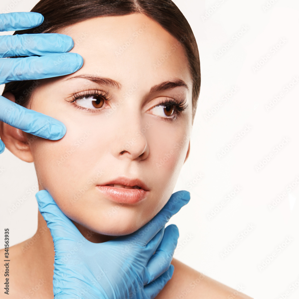 Facelift hydra treats. Esthetic skin care analysis. Doctor hands in gloves. medicine facial beauty exam. Symmetry consult. Cosmetology wrinkle specialist.