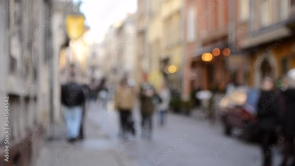 Abstract Defocused Blurred Background of many people on street square Abstract Defocused Blurred Background of many people on street square