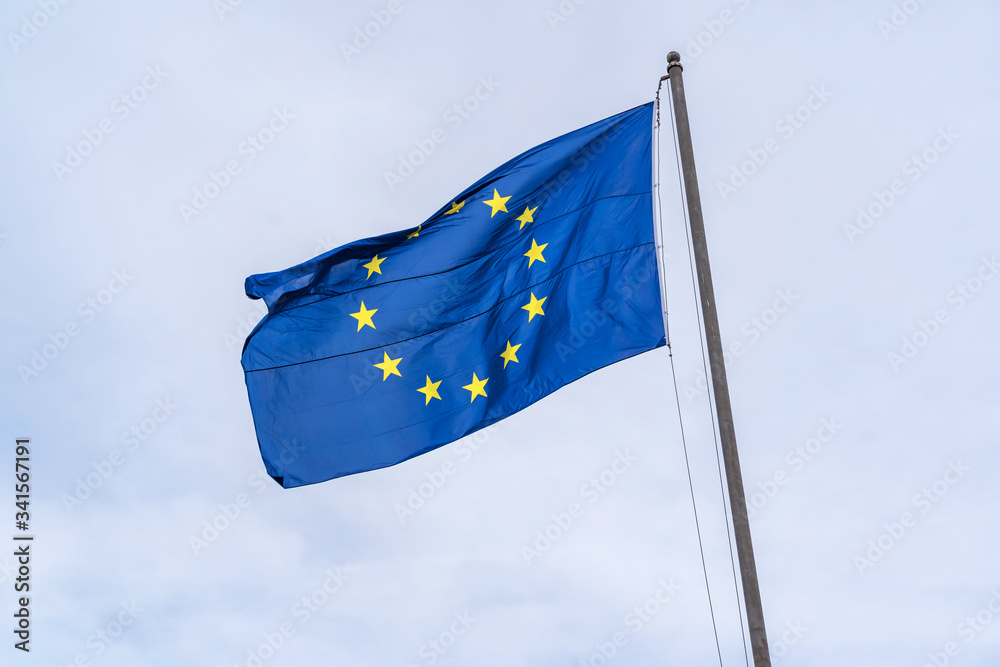 European Union flag on blue sky background in Rome