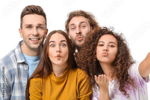 Friends taking selfie on wh...