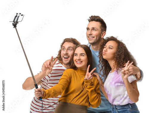 Friends taking selfie on wh...