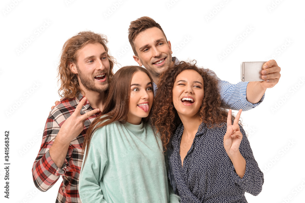 Friends taking selfie on white background Friends taking selfie on white background