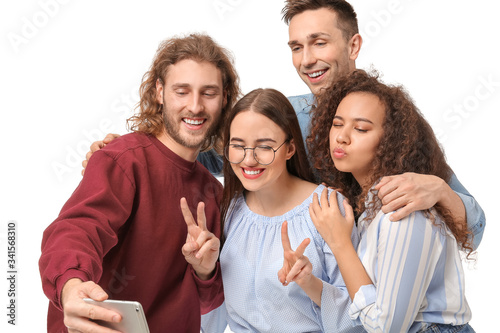 Friends taking selfie on wh...