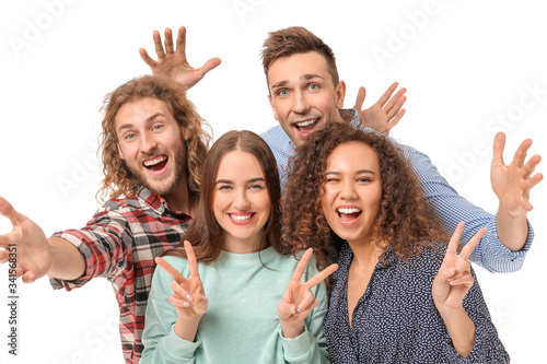 Friends taking selfie on wh...