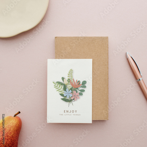 Floral postcard mockup on a pink background photo