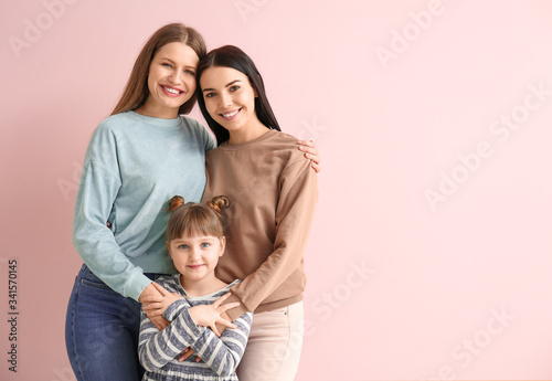 Happy lesbian couple with l...