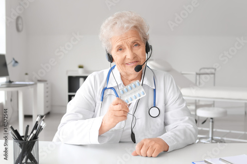 Female doctor giving a cons...