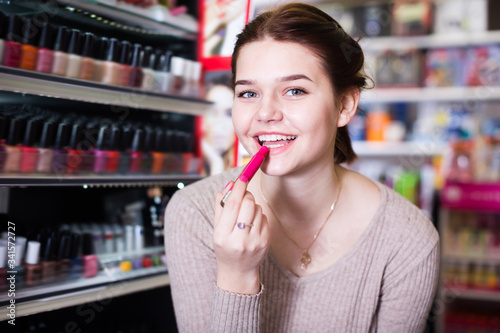 Pretty customer searching for reliable lipstick