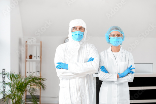 Receptionist with doctor in...