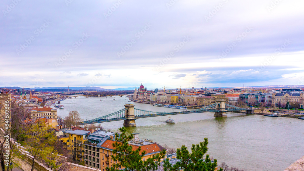 View of Chain Bridge, Hungarian Parliament and River Danube form Castle Garden Bazaar, Budapest Hungary.