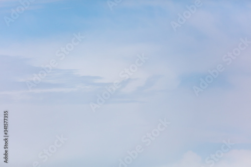 White clouds on a blue sky as background © schankz