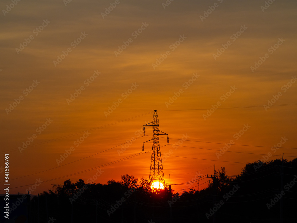 electric pylon at sunset