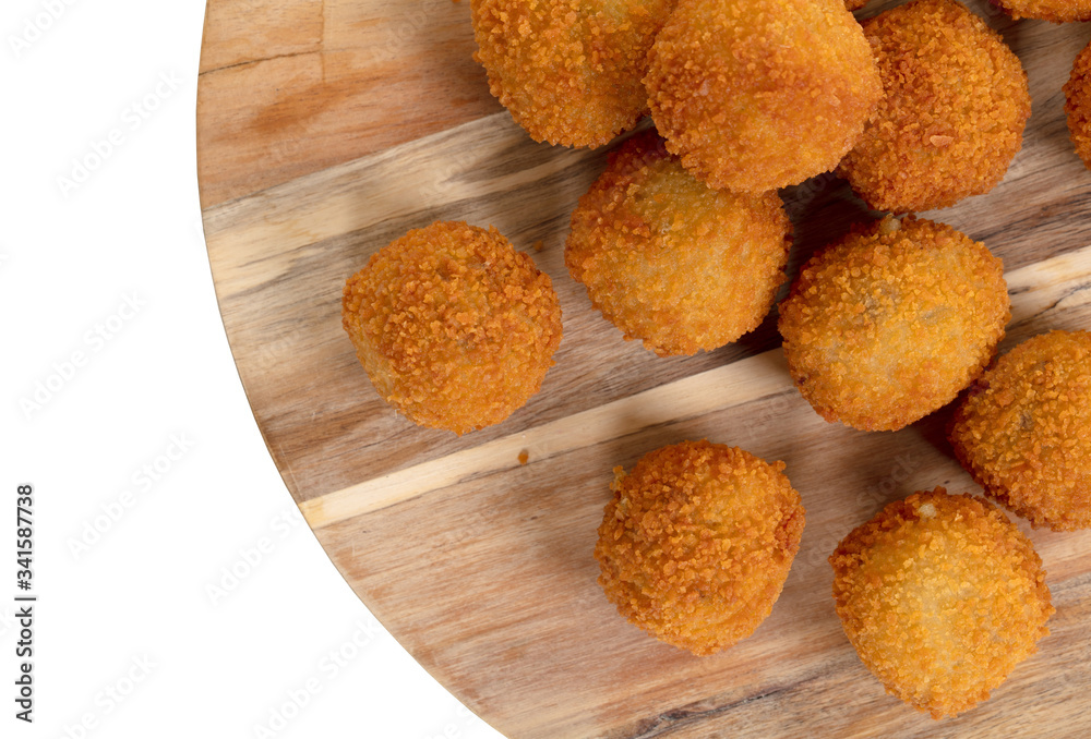 Dutch traditional snack bitterbal on a serving board Dutch traditional snack bitterbal on a serving board