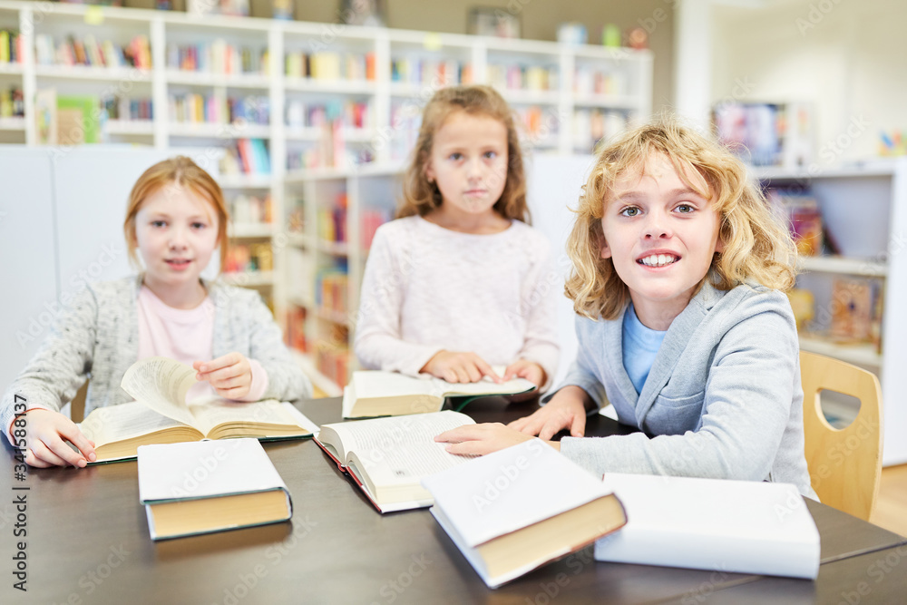 Group of students is learning in the library Group of students is learning in the library