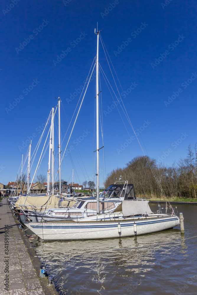 Fototapeta premium White sailing yachts in the harbor of Harlingen, Netherlands