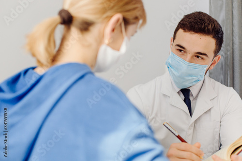 Doctor examines the patient . Medicine and health care concept.