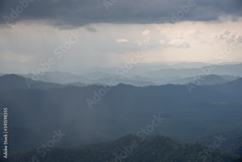 beautiful mountain landscape during a rain and clouds