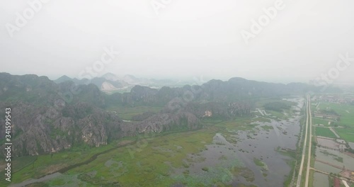 Aerial view Van Long Wetland Nature Reserve, Ninh Binh, Vietnam, called A Bay without waves, holds two national records for having the most Delacour langurs and largest unspoiled landscape in Vietnam photo