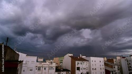 Timelapse 4k of rainbow over the city storm sky Valencia Spain