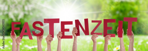 Bild auf Leinwand People Hands Holding Red German Word Fastenzeit Means Fasting