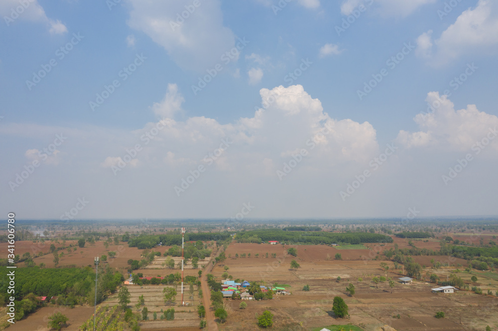 Aerial view, rural area, bright blue sky with clouds after rain