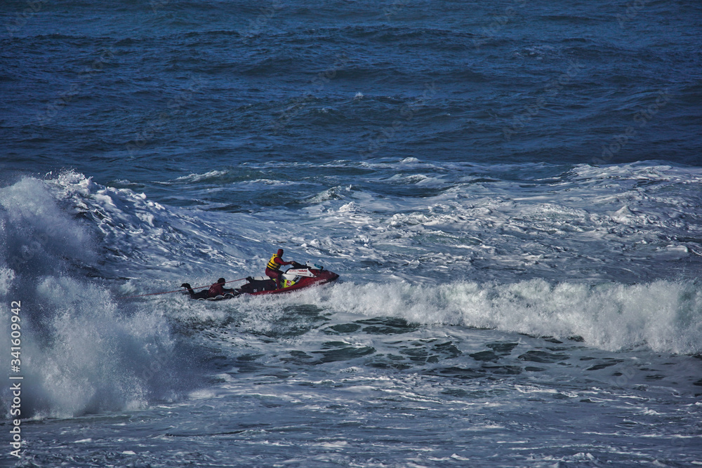 Aerial view of surfer riding big wave on the North Shore, Hawaii. Drone Photo Aerial view of surfer riding big wave on the North Shore, Hawaii. Drone Photo