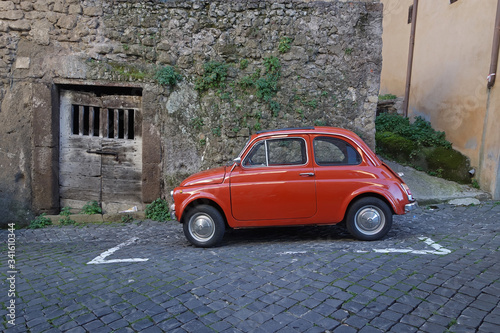 small red  Italian old car photo