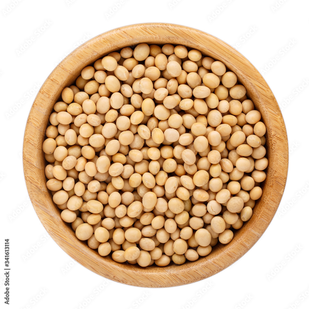 Dried soybeans in wooden bowl isolated on white. Top view. Dried soybeans in wooden bowl isolated on white. Top view.